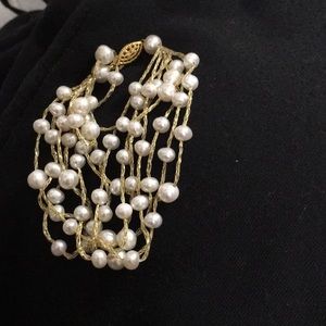 Multi string pearl bracelet